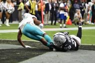 Jaylen Waddle getting tackled for a safety